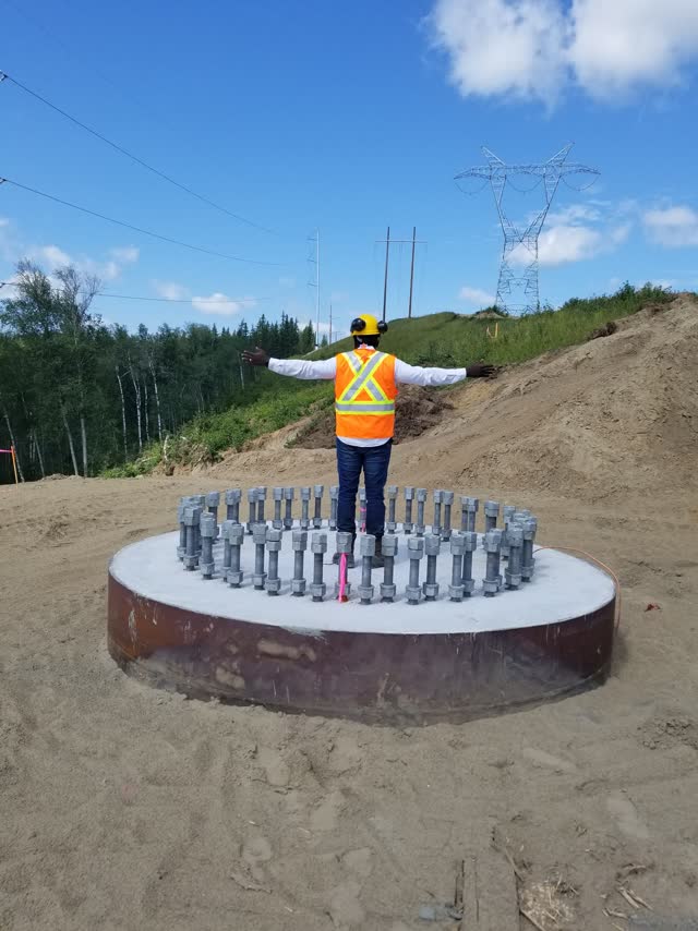 Completed anchor-bolt foundation cap inspected before structure erection