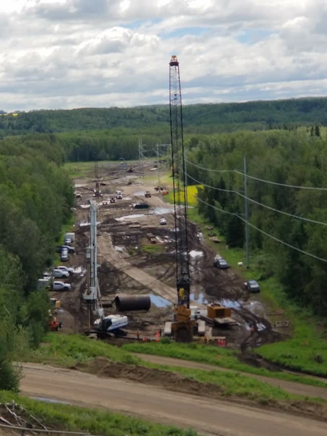 Foundation drilling along a transmission right-of-way access road