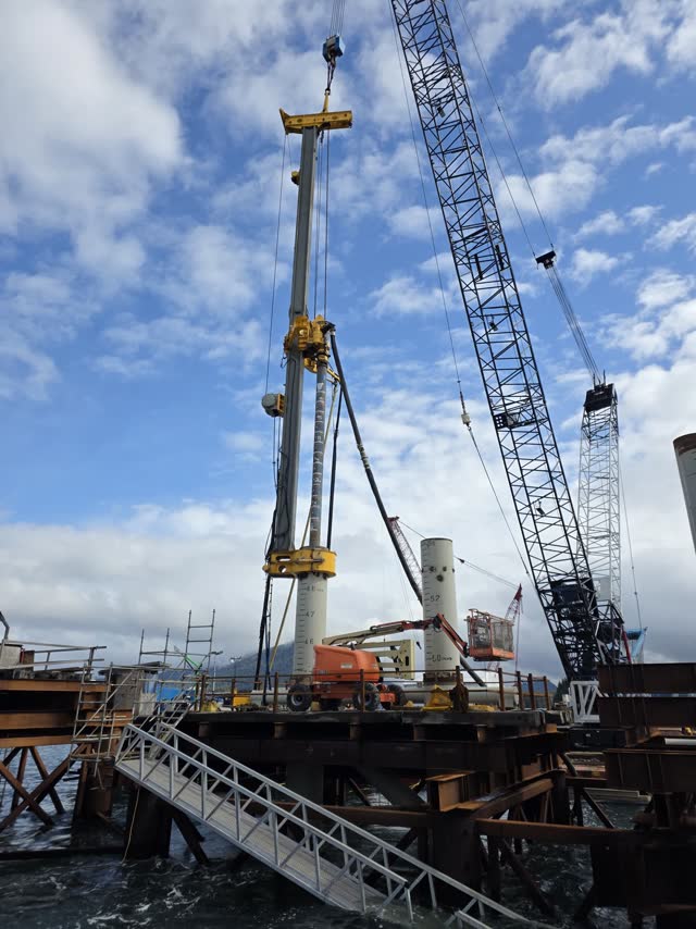Pile rig installing foundations inside an operating process plant